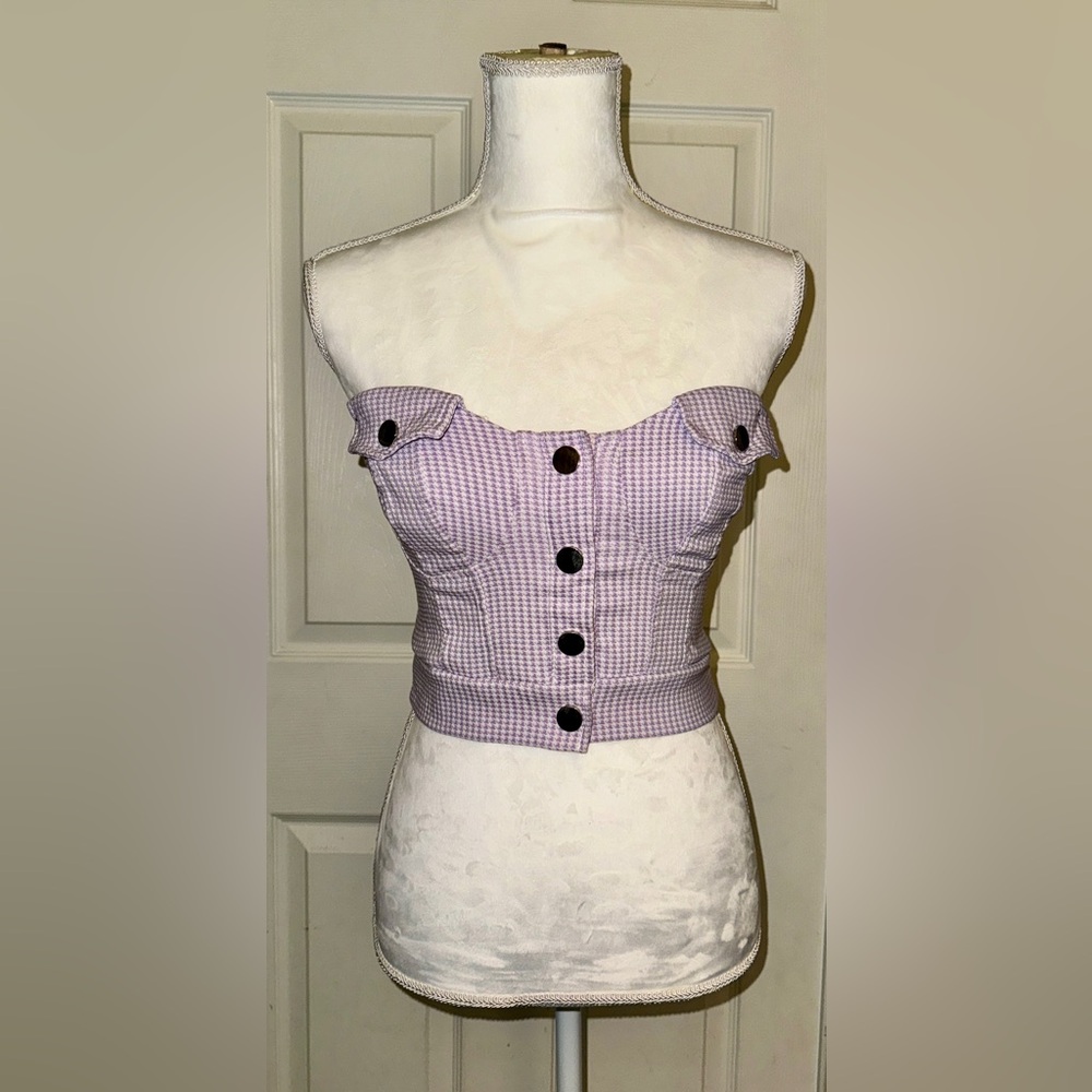 Lavendar button up bustier. Similar looking to the Chanel spring 1994 collection